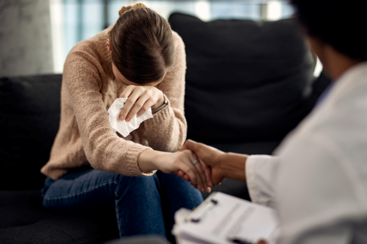 depressed woman with psychotherapist