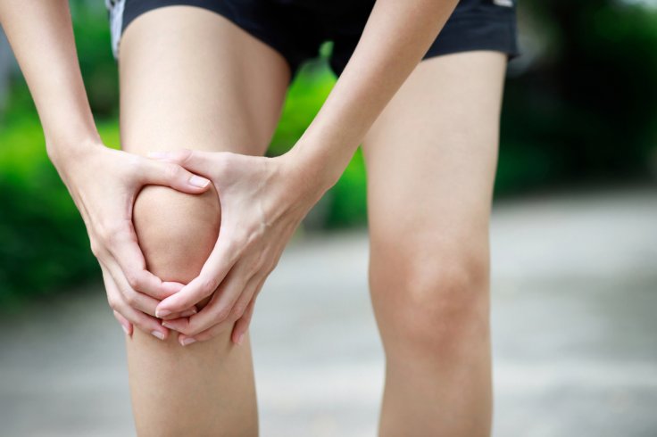 Child Runner Experiencing Knee Pain