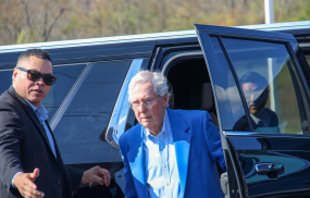 Mitch McConnell continues receiving his Senate salary while recovering from a fall, highlighting differences between congressional benefits and paid leave for workers.