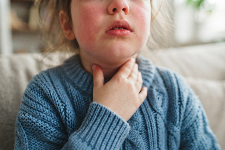 child with sore throat