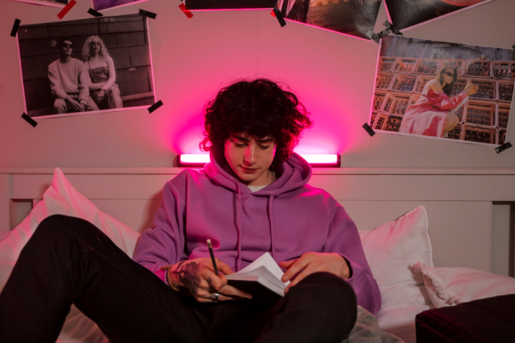 teen in bedroom